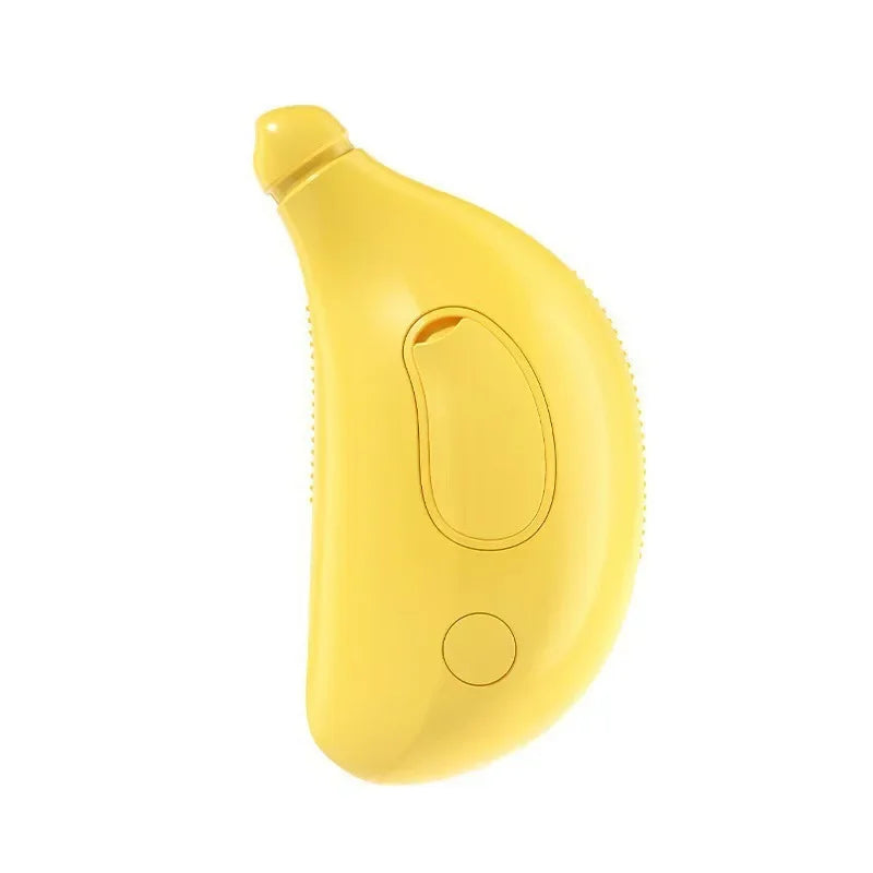 Yellow banana-shaped 3-in-1 pet steam brush for cleaning and massage