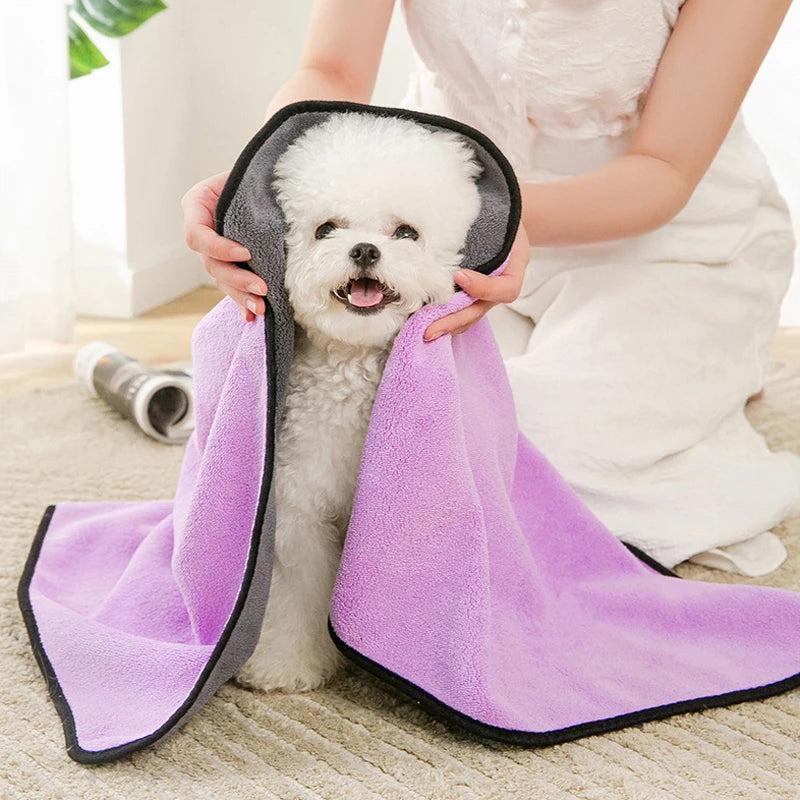 Quick-Dry Pet Bath Towel in use, showcasing its effectiveness in drying pets quickly after bath time while keeping them cozy and warm